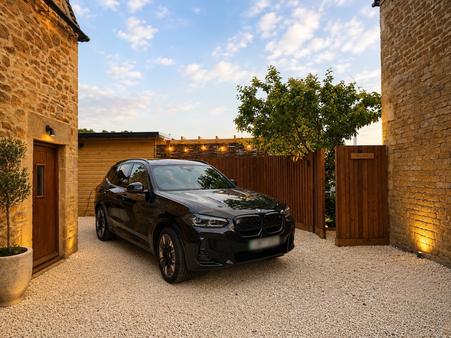 Private gravel driveway and cottage entrance